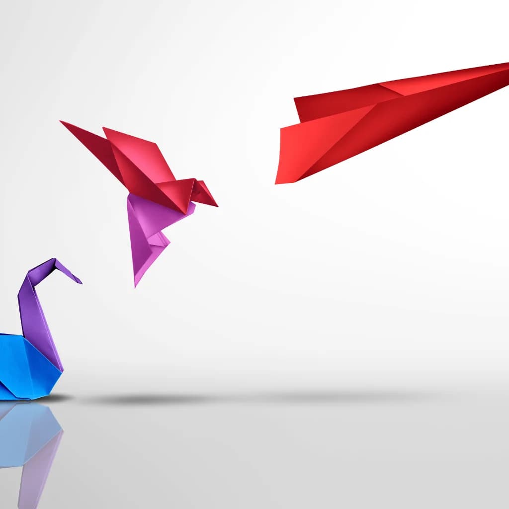 Origamivögel, die sich in einen roten Papierflieger verwandeln